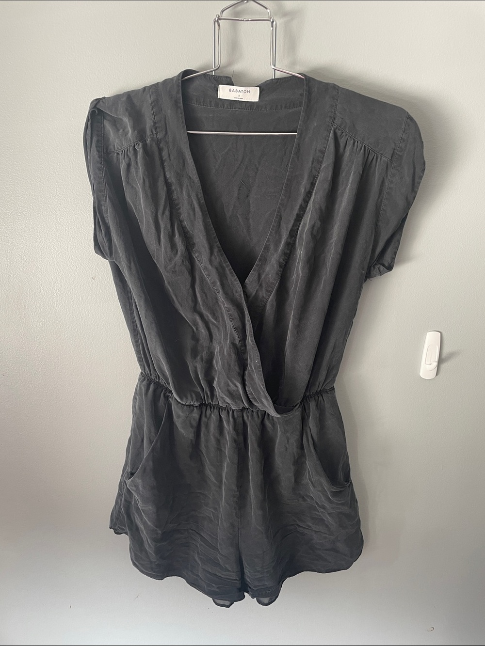 Babaton Black Surplice Silk Romper with Pockets